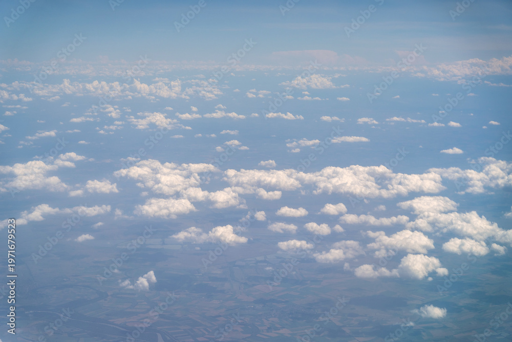 Obraz premium Blue Sky with White Clouds, Flying above Sunny Cloudy Sky Texture Pattern, Fluffy Clouds Plane View