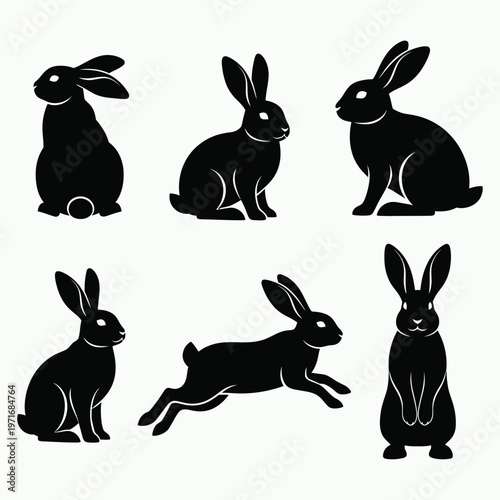 Six black silhouette rabbits a collection of hare poses and forms in a minimalist design