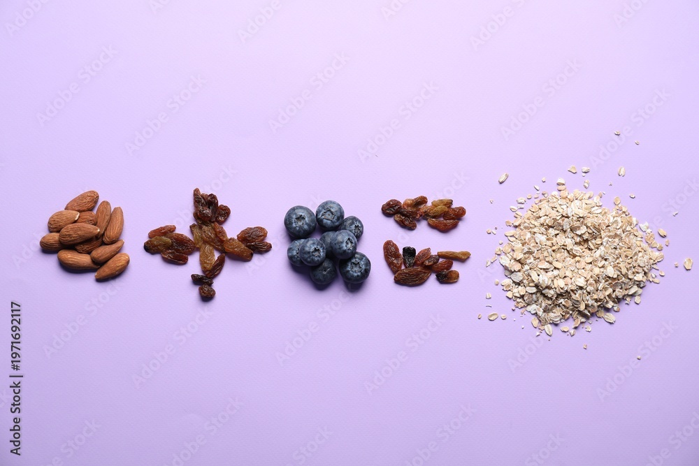Obraz premium Math equation of oat flakes and other ingredients on lilac background, flat lay