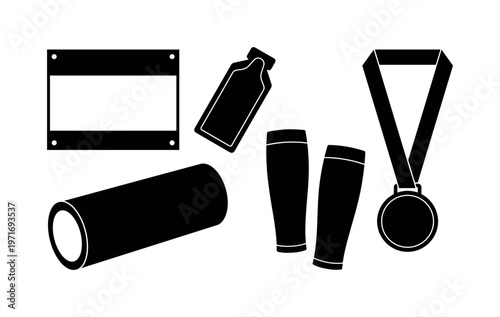 Race bib number sheet with pins, energy gel packet sachet, foam roller recovery tool, compression calf sleeves pair, finisher