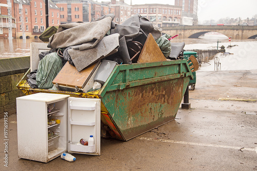 Fotografie Piles of rubbish in a skip, the aftermath of a disastrous flood.