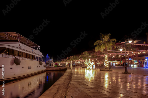 Luxury Yacht and Festive Star Decorations at Hurghada Marina Night Promenade