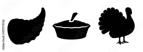 Black silhouettes of turkey, stuffing and cranberry sauce on for thanksgiving