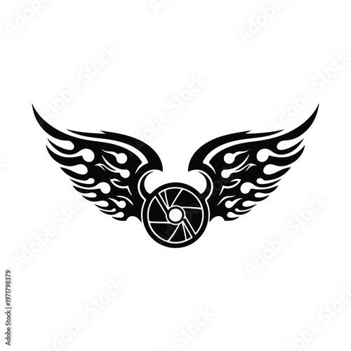 Stylized tribal design featuring flaming wings attached to a camera aperture, presented as a graphic element against a white background