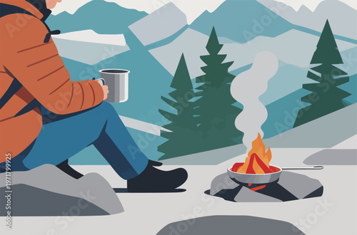 Person enjoys a hot drink while sitting near a campfire in the mountains on a cold day