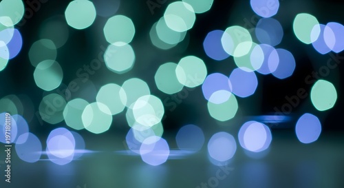 Soft focus blue and green lights creating bokeh effect for festive decoration