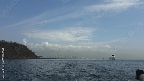 Cityscape of Panama City, Panama and boats in the harbor.