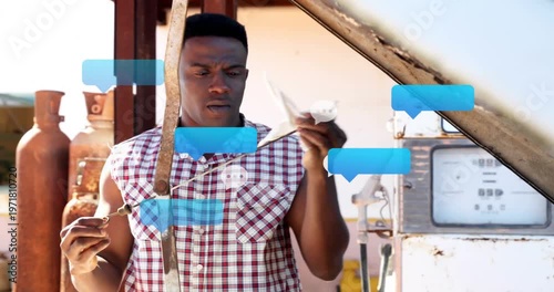 Auto tech using prop rod, checking part and wire, diagnosing fault, blue chat bubbles appearing