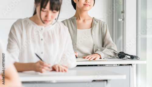 Принти на полотні Elementary, middle, and high school girls in casual clothes attending classes at school or cram school