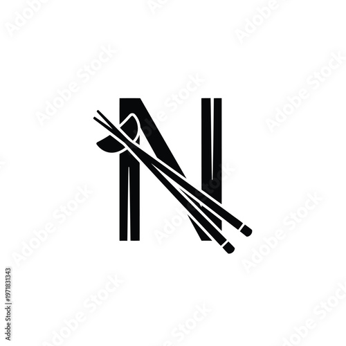 Modern scissors with metallic blades and black handle grips