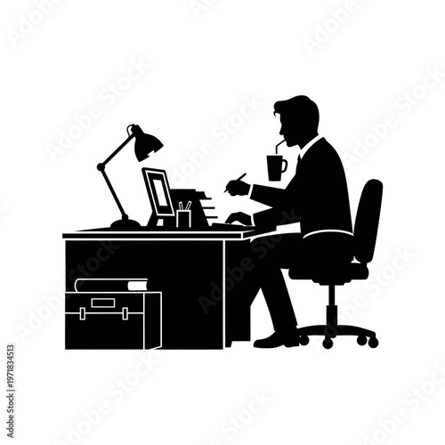 Concentration in the Office: A silhouette captures the focused intensity of an individual immersed in work at their desk, illustrating dedication and productivity.
