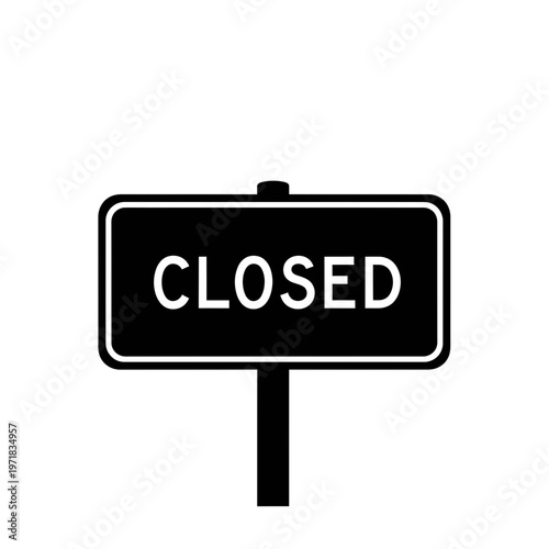 Closed Sign: A stark, minimalist sign announces CLOSED, its simple message standing out against its surroundings. 