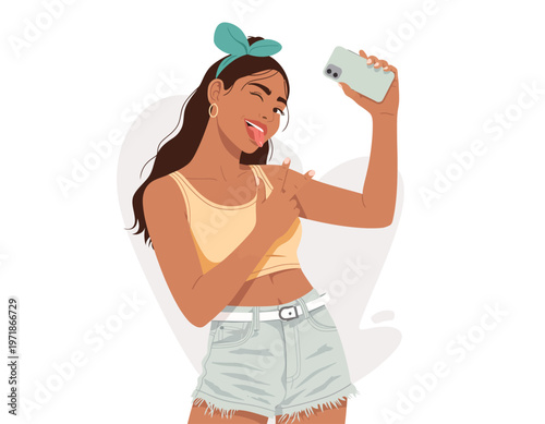 A young woman or a teenager with a bow in her hair takes a selfie with her phone, winking and sticking out her tongue.