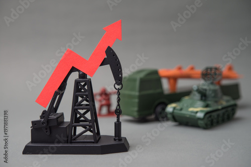 Crude oil pumpjack, raising red graph with soldier fights, weapon war background. The oil price hiking impact of the war, energy crisis, supply shortage, recession and inflation global economy concept