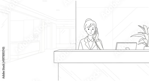 Woman sitting at reception desk.
