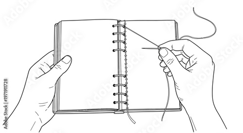 Hand stitches open notebook with needle and thread, close-up view