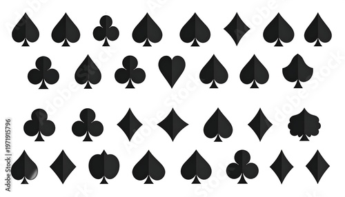 Black Playing Card Suits Arranged in a Pattern.