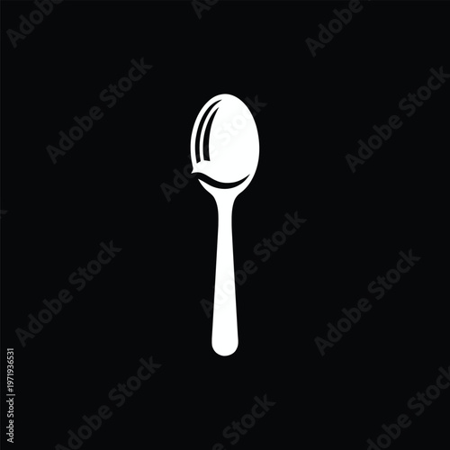 Isolated White Spoon on Black Background for Culinary Use.
