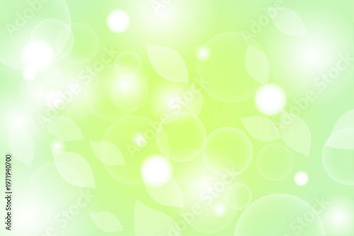 新緑イメージの爽やかな緑グラデーションと葉と光の抽象背景素材