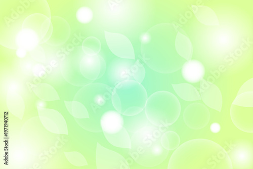 新緑イメージの爽やかな緑グラデーションと葉と光の抽象背景素材