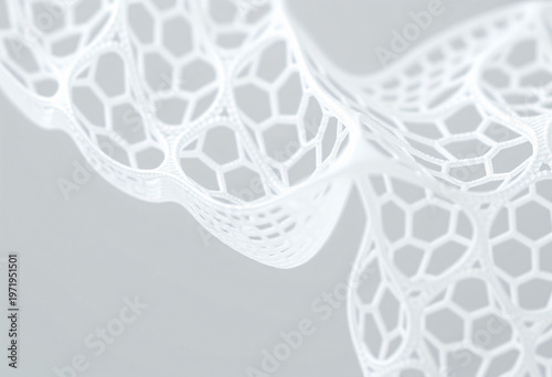 Macro shot of a 3D printed white bio-polymer mesh for medical technology.