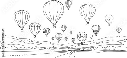 hot air balloons flying over landscape