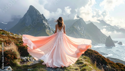 Woman in flowing gown gazes upon mountains and ocean from hilltop