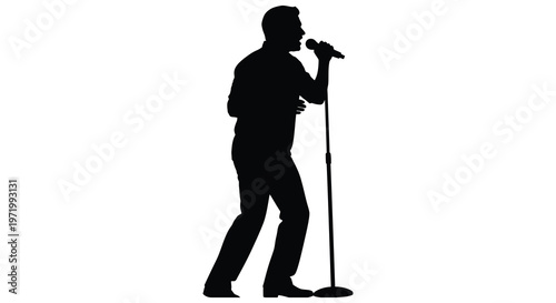 Singer performing with a microphone on stage a striking black silhouette