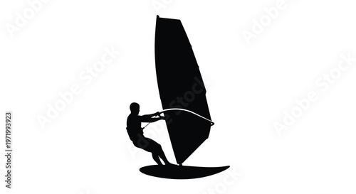 Windsurfer riding a wave dynamic action shot with a striking silhouette