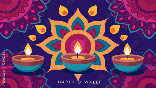 Diya lamp with floral rangoli design and lit candles