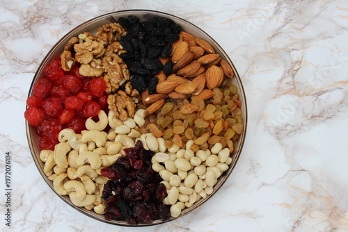 fruit and nut mixture beautifully arranged on a plate,