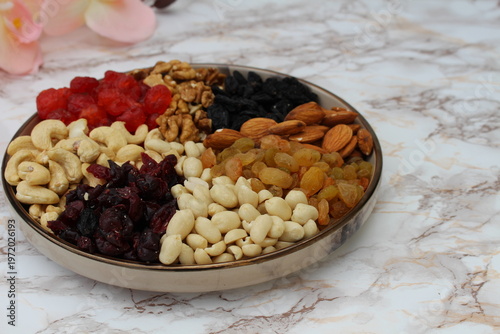 fruit and nut mixture beautifully arranged on a plate,