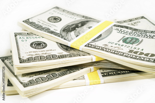 stack of 100 dollar bills