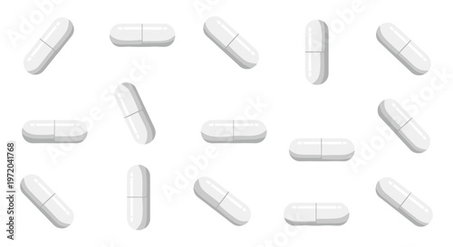 Fifteen white oval capsules are scattered in various orientations on a pristine white background.