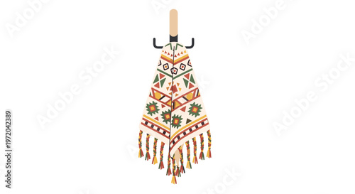 A pixelated illustration displays a patterned blanket with tribal motifs and braided tassels hanging from a wooden hook against a white background.