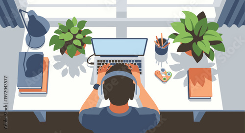 Productive remote worker typing on a laptop at a bright home office desk with headphones and plants, illustrating a modern digital workspace setup.
