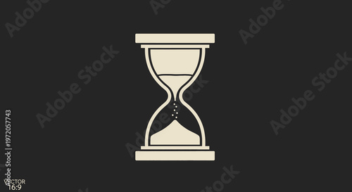 Vintage hourglass with flowing sand, representing time passing, countdown, and the concept of urgency.