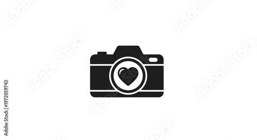 Camera with heart shaped lens.