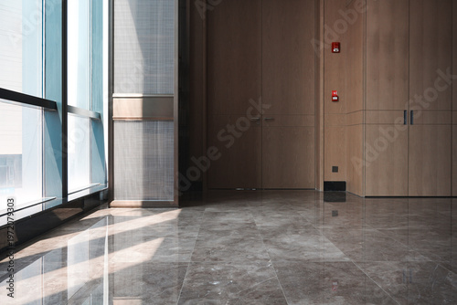 Fotografie Modern office interior featuring wooden doors walls and floor-to-ceiling windows