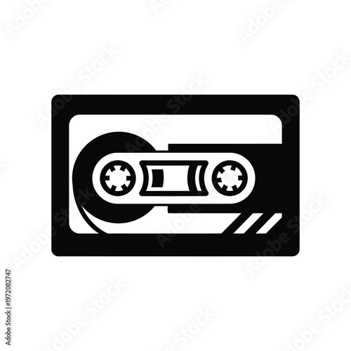 Black Silhouette Icon of a Cassette Tape on White Background