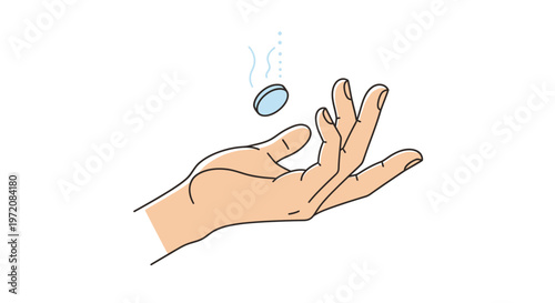 Hand with a pill in air.