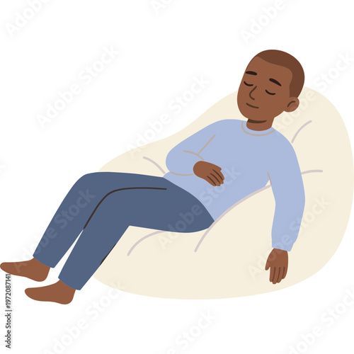 A man is sleeping peacefully on a large beanbag chair indoors.