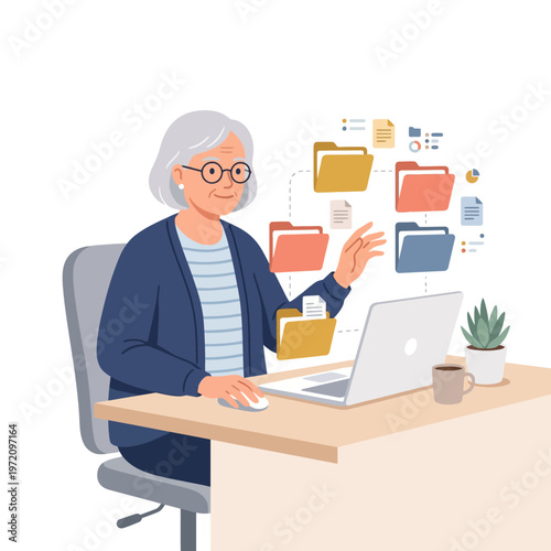Elderly woman organizing digital files on laptop at desk.