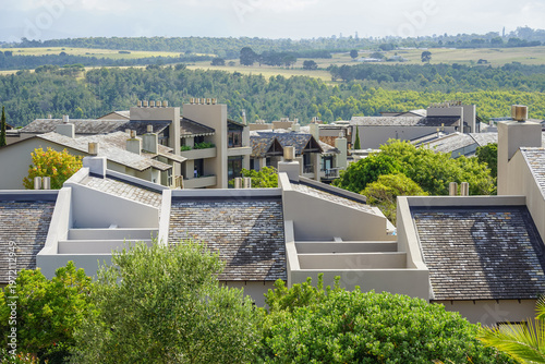 Quadro su tela South Africa,Golf Resort,Aerial view of modern residential rooftops surrounded b