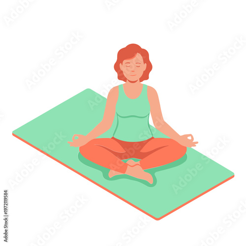 Woman meditates peacefully on yoga mat indoors
