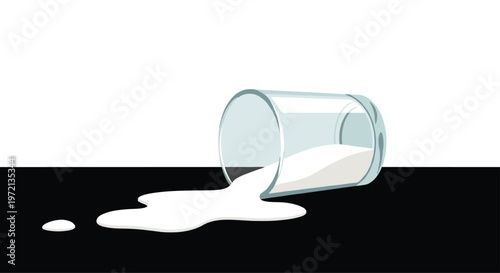 A single transparent glass lies horizontally on a stark black surface while a thick pool of fresh white milk flows out onto the dark foreground area.