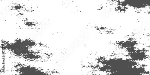 Abstract digital image with a dark gray splattered ink blot, suitable for texture background. 