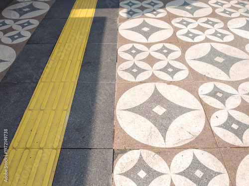 Pavement and Road. Yellow Tactile Paving for Blind and Visually Impaired on Urban Sidewalk