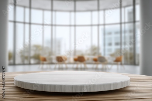 Empty Circular Display Stand on Wooden Table in Modern Office Interior.
