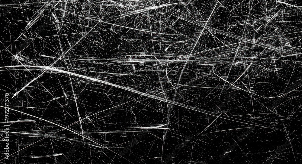 Obraz premium Abstract background of many chaotic white scratches, grunge texture with lines on black surface.